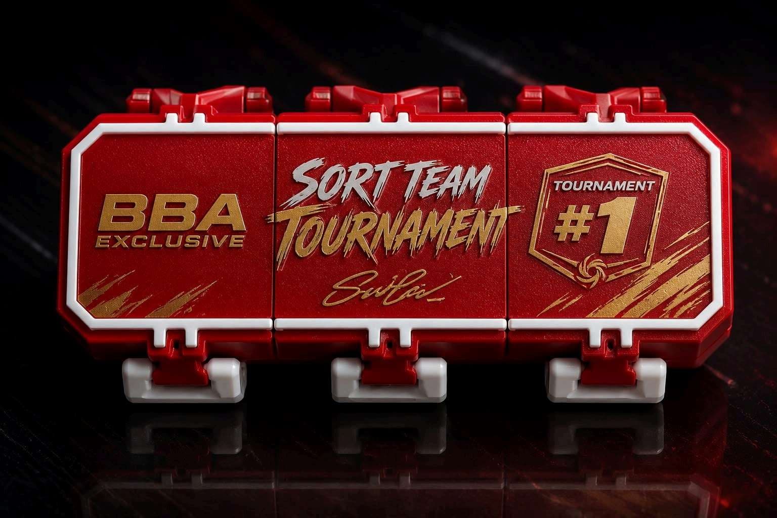 A BBA Exclusive tournament deck box in red and gold, marked Sort Team Tournament, Tournament #1.